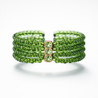 BRANSOLETKA ZIELONE CYRKONIE W MOSIĘŻNEJ OPRAWIE